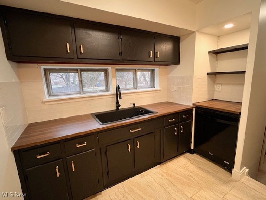 Blinds, curtains, all light fixtures, and bird bath staying. Near Lake Erie - walking distance.