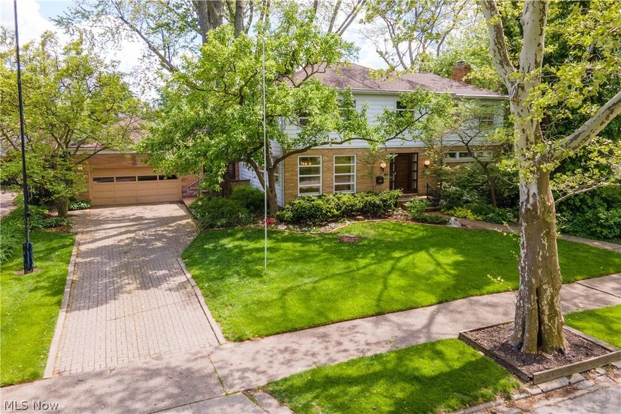 WOW! What a special home on one of the most charming streets in the Sandusky area. This one-owner contemporary home was inspired by Frank Lloyd Wright design, is stunning in current form but can easily be a modern masterpiece with the right cosmetic touches. Stunning rectangular windows throughout provide wonderful views of the tranquil and beautifully landscaped backyard with perennials galore and mature trees. Spacious living areas allow for wonderful entertainment spaces. The fully equipped kitchen could easily be opened to the living area. A fabulous attached 3 car garage with additional storage off the back and charming greenhouse to sustain any gardener through the winter. Upstairs, find 4 very nice sized bedrooms and two full bathroom. The master suite particularly is perfectly laid out with a glamour bath. Meticulously cared for and pride of ownership! Ample storage within the basement. Central vac! One won't find an opportunity like this everyday! Enjoy a sidewalk and treeline