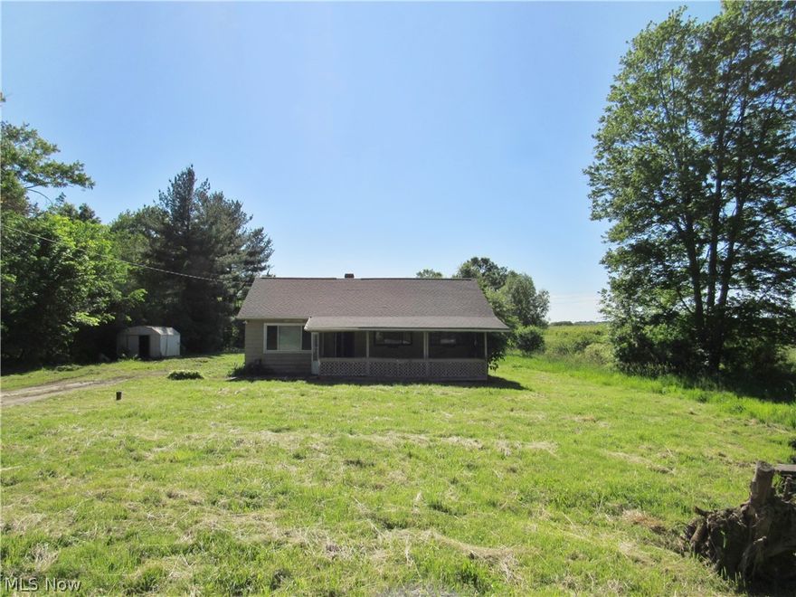 Great opportunity!  This home is on 1 acre of land.  There is natural gas run to the home.  There are wood floors throughout the first floor except the kitchen and bathroom.  There is a walk up 2nd floor that could be used as storage or anyway a buyer sees fit.  The owner's suite has a half bathroom.  It close to shopping and SR 43.  There are many possibilities with this home and what the lot size has to offer.