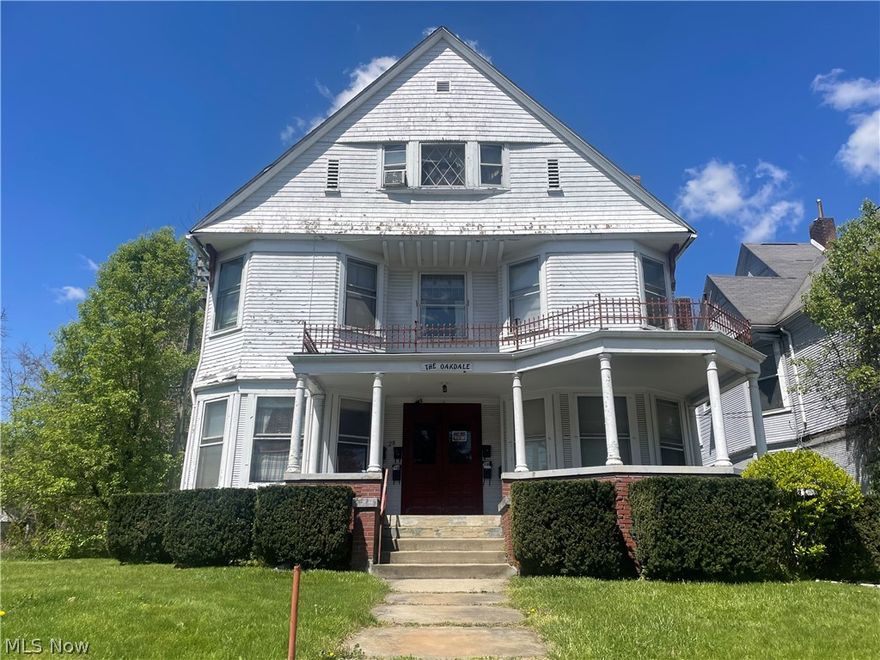 6 units (3 floors) with the potential for 7th unit above the detached garage.  Most units have range and refrigerator.  Some contractor work needed.  Ample parking.
Great potential for residential income.  
Seller has owned for 50+ yrs.