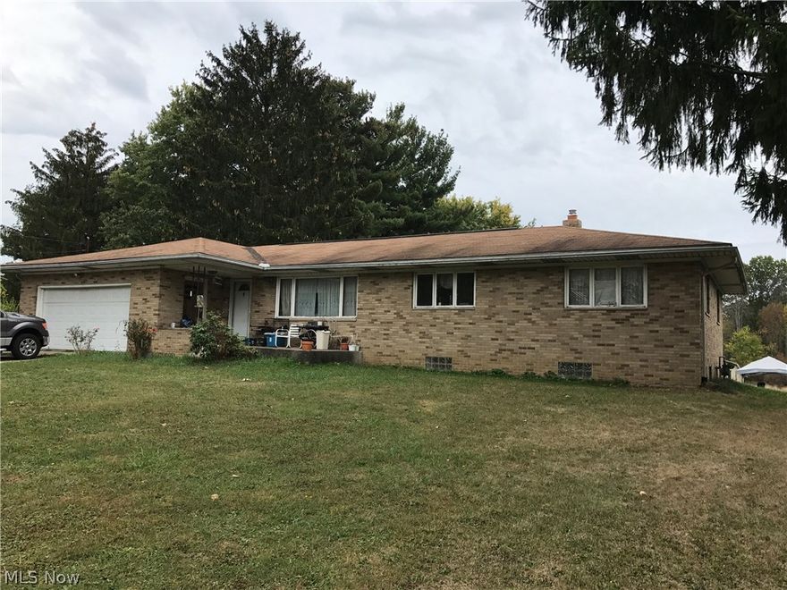 Investment dream opportunity! This diamond in the rough has three (possibly four) bedrooms with two full baths. Ranch style living. New furnace, and hot water tank! Over 1,600 square feet above ground, just waiting for some TLC! Brick exterior on home and over 1.5 acres of land. Full basement, partially finished adds plenty of space.  Call today before this opportunity us gone! BEING SOLD AS IS!