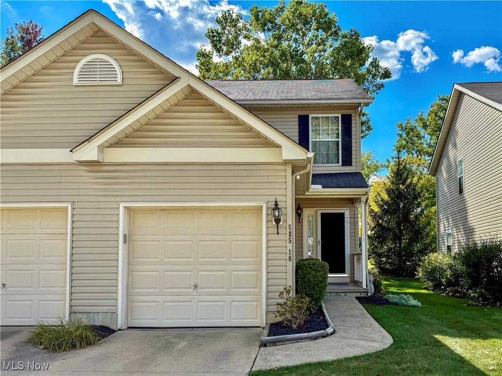 Welcome to 585 Birch Hill Drive #10! This updated 2-story condo features 2 bedrooms, 1.5 baths, and thoughtful updates throughout, including all newer flooring with luxury vinyl plank on the first floor and newer carpet upstairs. The freshly painted interior creates a modern feel, while the inviting entry opens to a thoughtfully designed kitchen with a newer stainless farmhouse sink, loads of cabinet space, stainless appliances that stay, and an updated light fixture. The kitchen flows into a bright living area highlighted by a corner gas fireplace with a connection above for your television and a slider to the private back patio overlooking a peaceful yard. Upstairs you’ll find two spacious bedrooms with newer carpet and an updated full bath. The lower level offers a full unfinished basement, perfect for storage, and includes the laundry area along with the furnace and hot water tank. A small front porch welcomes guests, while the association maintains the lawn and even provides mulch, leaving the landscape beds free for you to design. Additional highlights include refreshed bathrooms and landscaping, a WiFi-enabled garage door opener compatible with the MyQ app, and an attached one-car garage. Conveniently located just minutes from the North Court shopping district in Medina and only a 6-minute drive to the Historic Medina Square with shopping, dining, and entertainment.