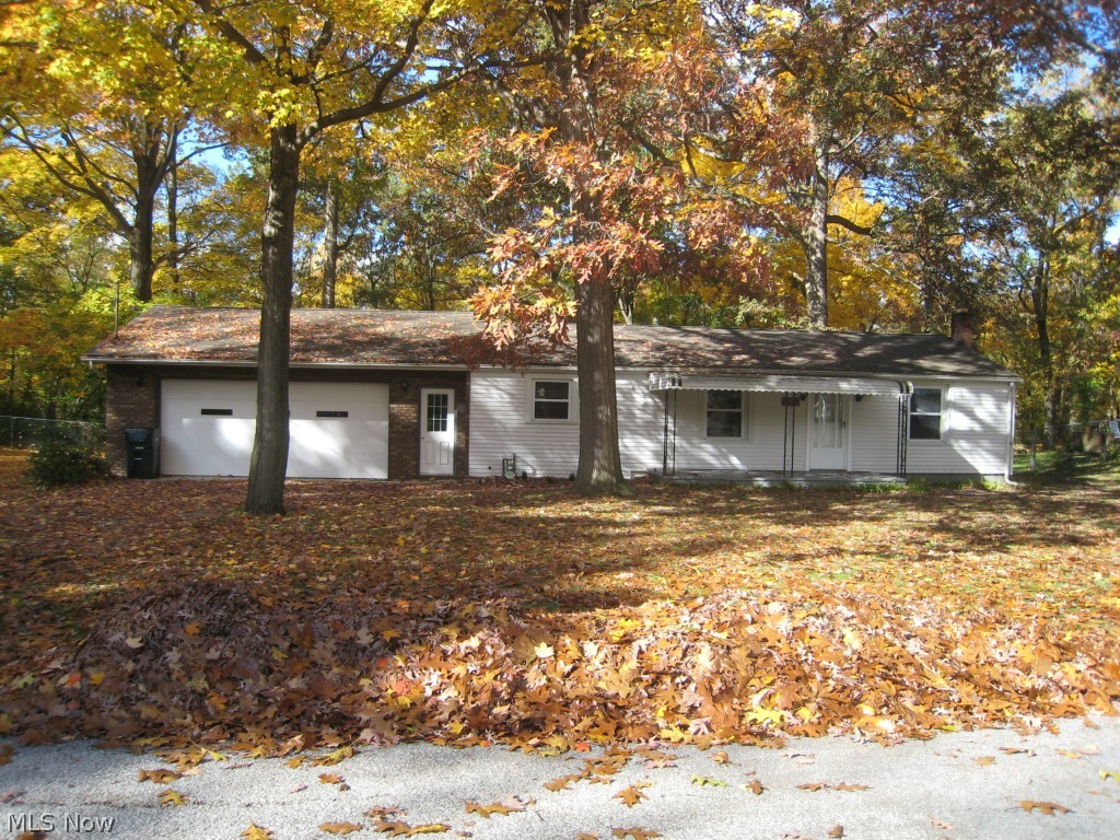 Nestled in the trees at the end of the street, this ranch is move in ready and meticulously updated with care. Features include remodeled bath, roof 5 years old furnace 10 years and central air 1 year, vinyl replacement windows and new dishwasher. Enjoy the convenience of the first floor laundry with entry from the garage. Mechanics dream oversized 2.5 car attached garage. Watch the golfers at Brookledge and the abundant wildlife. It's a beauty. Call to schedule your appointment now!