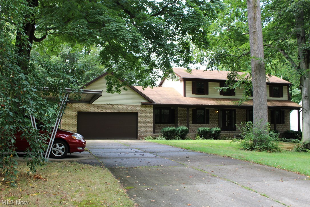 New and hot on market, this elegant colonial features 4 beds, 3.5 baths, 1 office, 1 fireplace, oversized 2 car garage plus 1 carport, finished walkout basement, porch, deck, pond view protected by fence! Looking for more? crown molding, chair rail, raised panel cabinets and pantry, full wall brick raised hearth, walk in closet ,make up vanity. The garage has H/C water, drain, electric, opener, pull down attic access and utility door. There are 2 bonus bedrooms and 1 full bath and 1 game room in the finished basement. The separating walls can be easily took down to make the whole basement an open giant one if desired. Newer flooring, carpeting, interior painting and the water heater is only 1 year old. Hurry up, get this one before someone else does!