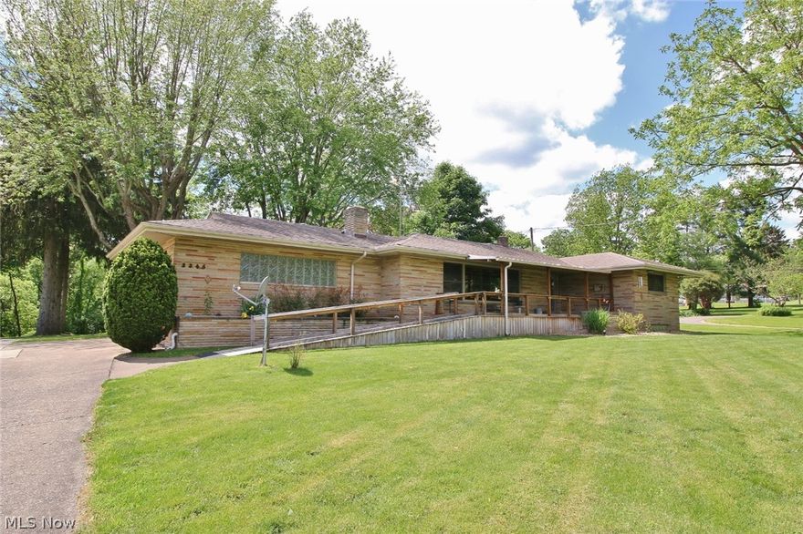 Immaculate home on a 1.29 acre park like lot.  2 bedrooms with an easily converted 3rd bedroom.  Lower level living space.  New windows with plantation blinds, Newer hot water tank, 2 bath fitter units, updated plumbing, newer carpet. (Hardwood under carpet)  Total of 3 car garage.  2 attached, 1 built in.  Great space for lawn equipment or workshop.