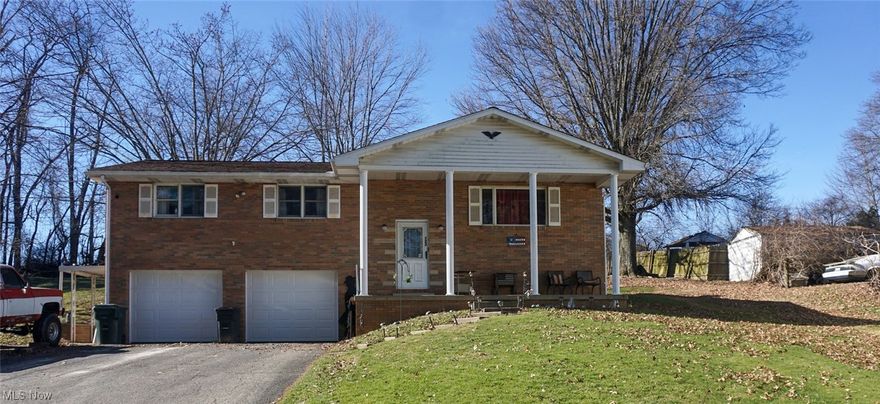 Come see this 3-bedroom 2 bath brick home just up the street from Epworth Park. This home boasts spacious bedrooms with a furnished rec room on the lower level. Never worry about getting in a cold car with a large garage with double doors and their own openers.  A radon mitigation system was installed in 2017. A wood burner in the utility room can be a secondary source of heat to the gas furnace that heats the home.  This house is situated on 3 lots in this quiet neighborhood. Run don't walk because this won't last long.