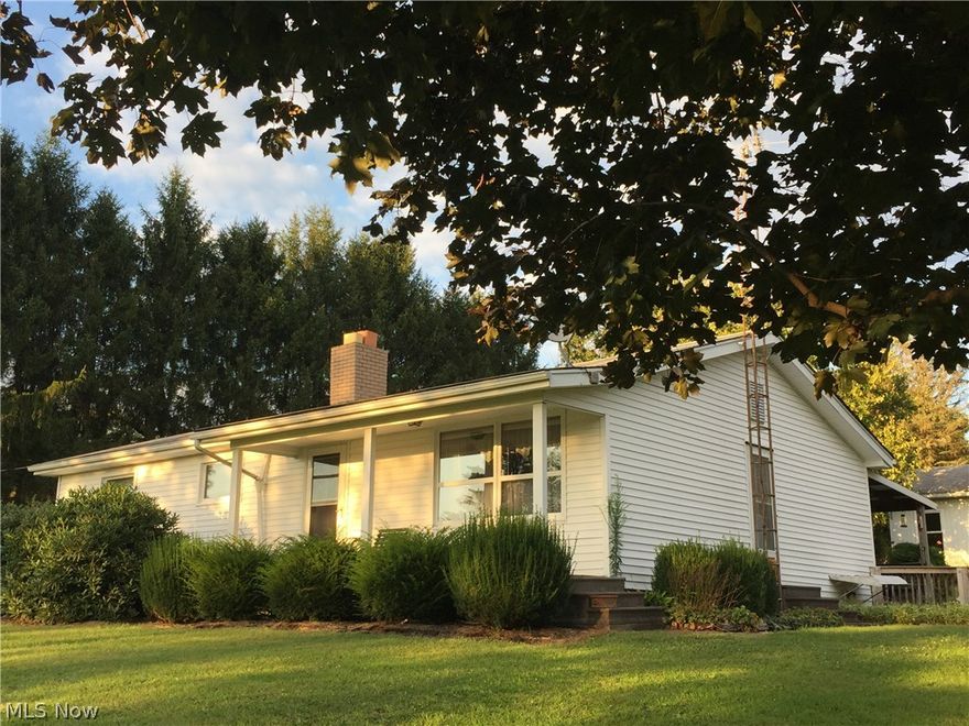 Extremely well cared for Ranch home on three acres has three bedrooms, two bathrooms, Main floor laundry closet, Full partially Finished Walkout Basement and Detached Garage.   There is a huge 12 x 40 Covered rear Patio and a 4 x 20 front porch.  Heat is fuel oil but there is also a wood/coal burner in the basement that has been used to heat the home as well.  In the basement is another kitchen, eating area, place to sleep and family room with an outside entrance.  Outside you will find three total acres with one acre of that being woods, any mineral rights owned would transfer with the sale but the status of those minerals is uncertain to the sellers. A Blacktop driveway takes you to the detached garage and workshop from there you can go to the oversized two car barn with a shed to the rear of that and lean to.  Behind that is the garden area with Mature trees and landscaping all around.  If you have been looking for the perfect place, This is it, Make this one your Last Stop.........