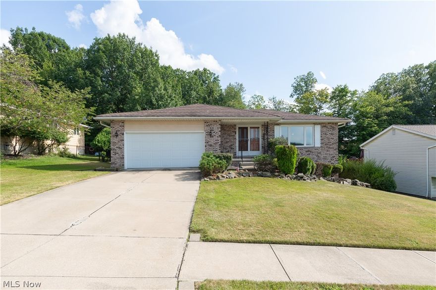 This home is ready for you to make your own! Enjoy the hillside, park like yard on either the large front porch or the back patio. This home boasts 2 living areas, both off the kitchen, making this home very easy to entertain in. Two car attached garage makes Winter a breeze. This is an outstanding opportunity for either an investor or owner occupant alike. You can easily double the living space by finishing the large and open basement. Do Not Miss Out!! She is Priced To SELL!!