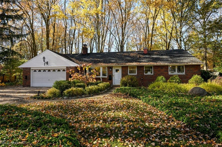 Calling all artists and nature lovers - this lovely brick Ranch sits on a perfectly named, tree-filled lane. A quiet retreat with tons of updates. Complete kitchen remodel in 2019, with sharp maple cabinets and granite countertops. Custom pull-outs & cookie sheet storage. All kitchen appliances new at that time including washer/dryer & freezer in the garage. Rich bamboo laminate flooring starts at the front door and flows through Living & Dining Rooms, down the hall into Bedrooms (2019). Sliders from Dining Room & Family Room access the paved Patio & wooded backyard. Updated fixtures and recessed lighting. Both Baths have been remodeled, with hall Bath completed in 2020. Newer furnace & A/C - 2016. This home also features quality Pella windows, bays & sliders. Exterior updates include new roof & gutters - 2016, spacious stamped concrete Patio & updated front yard landscaping - 2021, new shed - 2020. The home's outside walls & some inside walls have blown-in insulation. There is a huge floored attic for added storage. 2 gas fireplaces. Primary Bedroom was updated to include huge walk-in closet. The large driveway offers extra side parking, enough for 3 cars. Make sure to check out the VIRTUAL TOUR! This is a wonderful opportunity you don't want to miss!