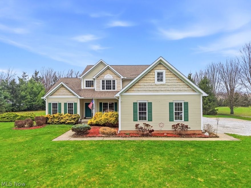 Tucked into 2.5 magical acres in Hiram, this home offers the kind of quiet restorative setting that makes everyday life feel a little more like a weekend retreat. The approach alone sets the tone—beautifully maintained and landscaped, tall trees, open sky, and a sense of privacy that’s increasingly hard to find. Inside, the home balances warmth and openness. Sunlight streams through windows, illuminating high ceilings & generous living spaces designed for gathering. At the center of it all, the great room’s fireplace anchors the space, both equally suited for cozy winter nights or lively weekends with friends and family. The kitchen flows effortlessly into the living and dining areas, with an expansive breakfast bar, the natural gathering place for everything from weekday breakfasts to late-night laughter. One of the home’s most charming features is the 1st floor primary suite, complete with its own vaulted sitting room—a flexible space perfect for a reading retreat, nursery, or peaceful home office. Upstairs, 2 bedrooms share a Jack-and-Jill bath while a generous loft offers the option for a 4th bedroom, playroom, or creative studio. Outdoors, the property truly comes into its own. Multiple decks connect the home’s living spaces and create an effortless indoor-outdoor flow. The backyard was thoughtfully redesigned to create an inviting entertaining area, with a paver patio and fire pit, and newer hot tub (yes it stays!). Behind the scenes, significant updates add comfort and peace of mind, including a new furnace ('24), hot water heater ('23), commercial-grade electrical panel, Generac generator, and upgraded water purification system. The lower level is plumbed for a full bath, offering the opportunity to expand the living space by more than 2,200 sqft. An oversized 3-car garage, rare acreage, and easy highway access come together to offer what many buyers want most: room to breathe, space to gather, and a peaceful setting without feeling far away from it all.