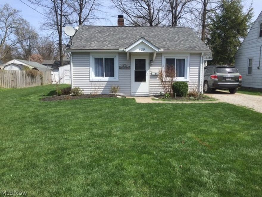 Larger than it looks! 1250 sq ft, 2 bedroom, 1 bath ranch with an additional parcel. Large master bedroom with walk-in closet. Generous second bedroom with ceiling fan. Roomy mud room/laundry off driveway entrance. Ceramic tile floors in kitchen and bath, pergo floor in living room. Private patio with well maintained oversized yard with shed. Close to shopping, Lake Erie and local parks. Award winning schools.