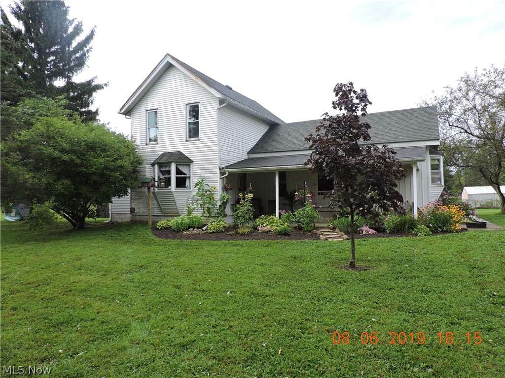 This gorgeous colonial setting on 13.01 acres boasts a stunning living room with natural woodwork, hardwood floors, a coal fed stove and beamed ceiling. The country kitchen has plenty of cupboard and counter space and a large pantry, office or hobby room close by. A first floor laundry area could also be used as a dining room. The modern first floor full bath is close to the 1st floor master bedroom. Add 2 more spacious bedrooms on the 2nd floor each with closet space all in move in condition and tastefully decorated!. Outside is just as exciting featuring a well built 36x60 outbuilding and a incredible 30x40 / 24x40 outbuilding which boasts 220 elec, insulated. A 4 horse stalls, and 2 other smaller outbuildings, a fenced in pasture and a gorgeous pond with a small pavilion for summer get togethers or just to relax. This home would make a great Horse Farm, or Gentleman's Farm!