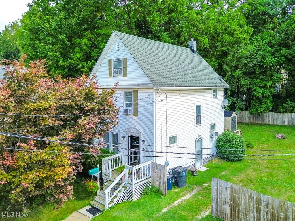 Welcome to this beautifully maintained 3-bedroom Colonial, perfectly situated on an extra-wide lot just minutes from downtown Akron. Step inside to find a welcoming layout featuring a formal dining room—ideal for entertaining or hosting family gatherings. The living areas are bright and spacious, filled with natural light. Upstairs, you'll find two comfortable bedrooms, plus a 2 finished bonus rooms on the 3rd floor—perfect for a home office, guest space, or creative studio. Enjoy peace of mind with a newer furnace and a roof that’s only 10 years old. Outside, the fully fenced yard offers privacy and space for pets, play, or gardening. Relax or entertain on the 15' x 10' back deck, a great spot for summer barbecues or morning coffee. Plenty of room to expand or enjoy outdoor living, thanks to the extra-wide lot—a rare find this close to the city! Don’t miss your chance to own a move-in-ready home just minutes from downtown, parks, and amenities.
