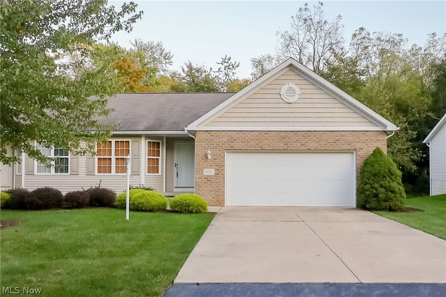 Spectacular 2 bedroom, 3 bathroom ranch condo with the best of one floor living! Great floor plan featuring a large cathedral ceiling living room with a 2 sided fireplace shared with an amazing sun room.  The fully applianced kitchen has beautiful cabinetry and a breakfast bar.  The dining area provides plenty of space for a more formal meal.  The main level has a wonderful master suite with a walk in closet and master bath with walk in shower and separate soaking tub.  The additional full bath has a tub/shower.  The first floor laundry comes with a newer washer and dryer and has a pass through closet to the linen closet!  Your guests will love the huge walk out basement with a rec room with bar, game room, full bathroom, and office or 3rd bedroom.  There's still plenty of storage space as well!  Calming wooded views and an ideal location make this easy living you've waited for!