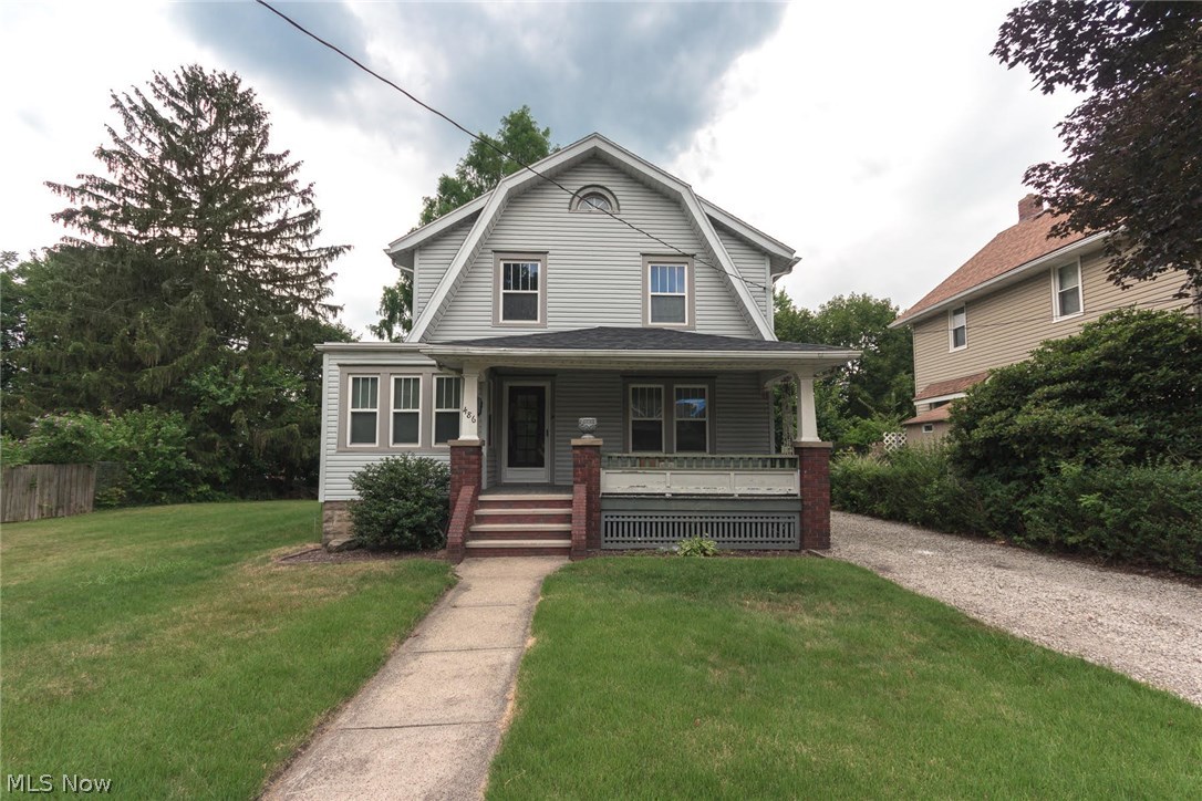 Move in ready Colonial situated on a quite street just minutes from Route 8 and downtown Akron! Large front porch and double lot offers ample outdoor entertaining space. The first floor features a spacious living room with a gas fireplace, well lit office space, and large storage closet. Kitchen offers a quaint breakfast nook, equipped with all appliances as well as a large formal dining room! A half bath is conveniently located near the back entrance of the home. The stairs up to the second floor lead to three bedrooms and an updated full bathroom. Original woodwork and hardwood floors throughout. Updates includes energy efficient replacement windows, lighting fixtures, HVAC, roof, waterproofed basement and paint. Outside boasts a two car garage and large side yard perfect for gardening, storage, and other activities! Schedule your showing today!