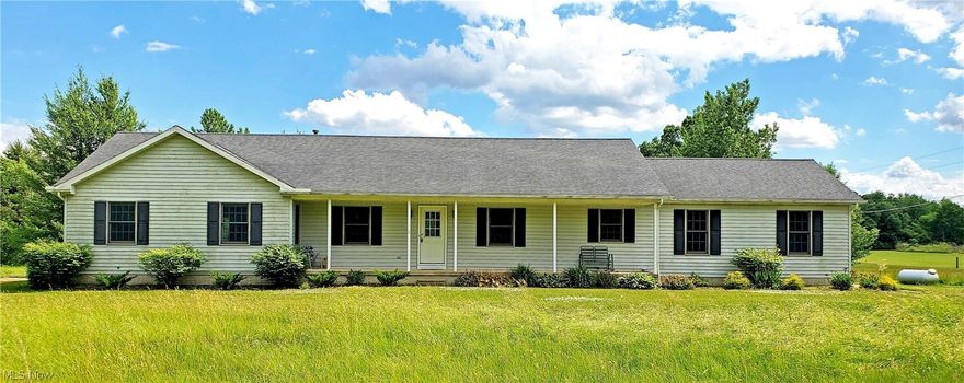 Custom built 3 bedroom, 2 bath ranch on 4+ acres includes 40 X 30 Pole barn with elec & shed! Hugh eat in kitchen with lots of counter space, newer cook top & oven, SS refrigerator, Dishwasher, newer slider and pantry is open into Family room with stone gas fireplace. Parquet floors throughout except carpeted Living room. Formal dining room and 1st floor Laundry rm with wall of built in cabinets! Large bedrooms and Master bedroom offers private bath with Jacuzzi tub, separate shower & walk in closet. Full basement has large bedroom that just needs carpet and offers two walls of closets. plumbed for bath. Tons of storage. Updates include vinyl siding on house and Pole Barn, 50 gal HWT, roof with tear off 2011. Large front porch and deck. Atth 2 car with H&C water! 1 year Home Warranty included.