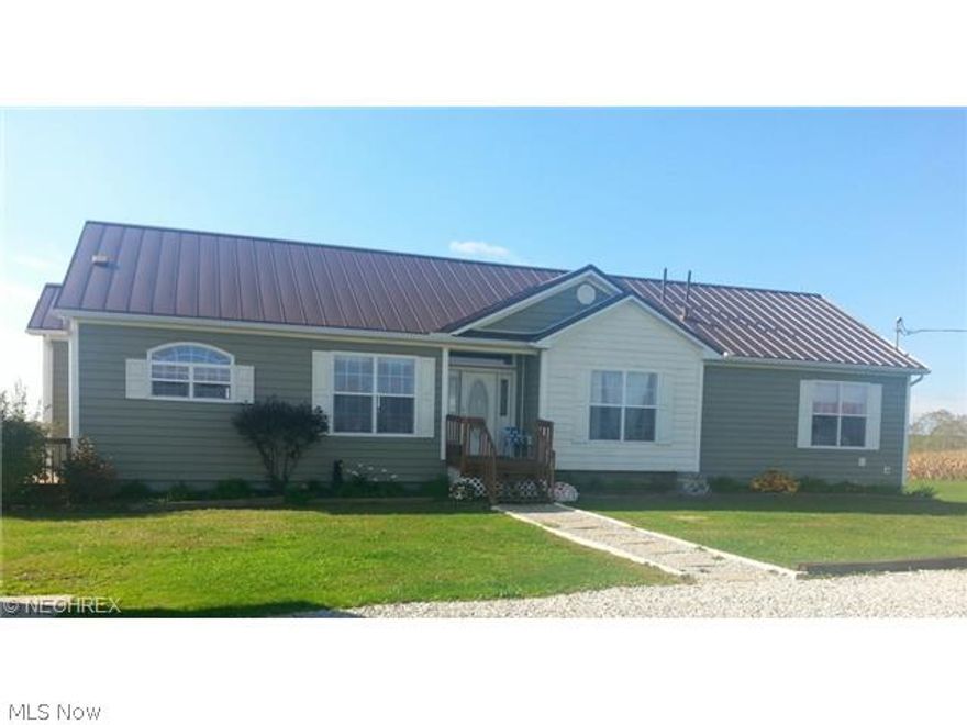 This beautiful ranch was developed on site in the year 2005. The home offers an open concept living, dining and kitchen area. A main floor laundry room resides off of the kitchen. The main floor also offers 3 bedrooms and two full bathrooms. The basement is large, open and ready to be finished off. The level lot features over 3 acres, detached garage and storage building.