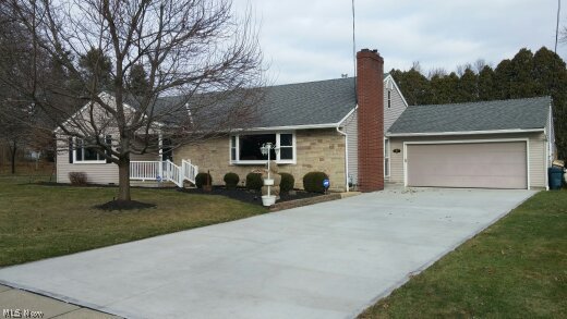 In one of the nicest, less traveled neighborhoods in Ravenna. This beautiful ranch home is in pristine move in condition. With almost 1900 square feet of open large rooms and partial basement this is a must see home. Featuring professionally landscaped yard and gorgeous private patio. The back yard is fenced in and set up to entertain. A modern efficient eat in kitchen has all new appliances in 2013. The home has quality laminate flooring through the kitchen and its spacious dining room. The living room is enormous and has a wood or gas fireplace with a blower. With its own master bath you will love the master bedroom with his/hers closets. The second bedroom is large as well. Newer to the home are windows in 2008, stone patio and arbor in 2009, updated master bath and laminate floors in 2008, insulation in 2008, gazebo in 2010. Two sheds and a new driveway in 2014.