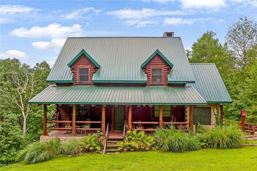 Yellowstone meets the Hocking Hills! This unique Amish custom-built home is a rare find. Three levels with panoramic views of the wooded lot to enjoy every inch of the privacy. The interior details are one of a kind from the whole tree supports and stairway to the tile and wood inlays. Soaring ceiling in the great room. All three levels have complete owners' suites. Would also make a great short-term rental. There are several fun hidden rooms including a game room. What makes this property special is the large, detached building with kitchen and full bath that is attached to a corral space that could easily have several horse stalls. If you like to ride, this property is adjacent to state land with 40 miles of the most popular trails in Ohio. 12 person hot tub/swim spa. The possibilities for luxury living are endless!