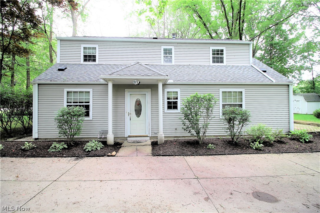 Welcome home to this charming Colonial situated on a large wooded lot in the heart of Stow. The first floor flows seamlessly with the living room that features an abundance of windows to let the natural light shine through and has built in shelves. The living room flows to the family room/eating area which has a stunning fireplace. The bright kitchen has lots of cabinets, new dishwasher 2017, all appliances stay and a window over the sink that overlooks the beautiful wooded lot. The first floor continues with a full bathroom and large laundry room. The upstairs offers two large bedrooms with ceilings fans and closets. The full bathroom separates the bedrooms. The gorgeous wooded backyard offers a full patio for entertaining or relaxing and has a large storage shed. The widened driveway was added for additional parking in 2018. So many more updates include roof 2010, hot water tank 2014, new water softener 2016 and the furnace and A/C have been serviced regularly.