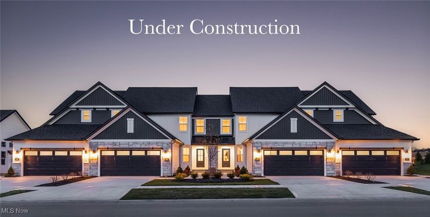 Gorgeous 3 bdrm Villa with 1st-floor primary suite, 1st-floor office, and walk-out basement with composite deck and lower level patio backing to protected conservation area! This popular plan welcomes guests with loads of curb appeal, a covered entry, and a spacious, dedicated foyer. A 1st-floor office w/ glass door is ideal for those who need a quiet place to work or tend to a hobby, and the open concept design provides for easy entertaining. The kitchen boasts a dramatic 2-story ceiling, soft-close cabinetry, sizable pantry, and large quartz island along with plenty of space for a dining table. The great room features a gas fireplace w/ quartz surround, luxury vinyl plank flooring, & ample windows that let in an abundance of natural light. An 8' door opens to a huge 20 x 16 low-maintenance composite deck w/ views of the conservation area and community pond. The 1st floor primary suite feels roomy with a vaulted ceiling, ensuite bath w/ dual quartz vanities, tile shower, & large walk-in closet. A 1/2 bath and laundry room w/ utility sink off the 2-car garage complete the 1st floor. Spindle-railed, open-tread stairs lead you to the 2nd floor, where you'll find two more bedrooms, each with walk-in closets, and a full bath that offers access from both the hallway and a bedroom. Owners will love the walkout basement with 9' ceilings, full-bath rough-in, and 8' sliding doors that open to a large patio, providing another approx. 1500 sq. ft. ideal for future finishing. Upscale features and upgrades throughout, this stunner is situated in the sought-after Bordeaux Crossings community, located directly across the street from Michael Angelo's Winery. Easy access to I-77, I-271, and the new Valor Acres, this central location is ideal for those looking for quick access to downtown Cleveland or Akron & local amenities. Low-maintenance living w/ lawn care and snow removal handled by the HOA. Photos for illustrative purposes, as home is under construction.