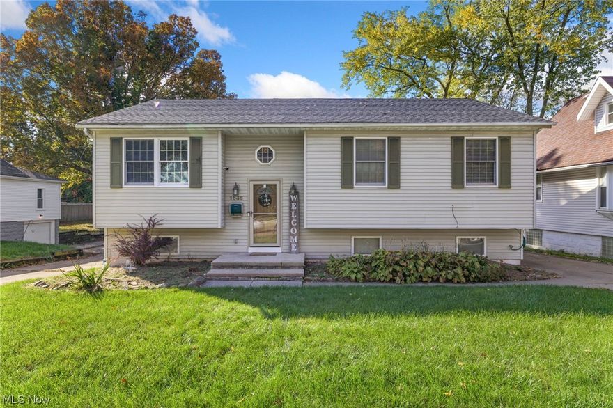 This 4 bedroom, 2 full bathroom bi level home with a new roof in 2022 is conveniently located near grocery stores, restaurants, & just a few minutes from the highway. The house itself sits towards the front of the large lot that has a deep backyard & includes a detached 3 car garage with an exterior covered port. The sprawling backyard is totally cleared & grassy, & holds endless opportunities. The main living level includes the spacious kitchen with stainless steel appliances, dining room, living room, 3 of the bedrooms & a full bath. The dining area has a sliding glass door that leads out to the deck. The lower level has the laundry room, large rec room with fireplace, mudroom, the 4th bedroom, & the 2nd full bath. This is the first time this home has been on the market in nearly 15 years. It has undergone thoughtful updates over the years such as recent paint, new screen doors, new ceiling fans, leveling & staining of rear deck, smart thermostat, & new lower level flooring in 2018.