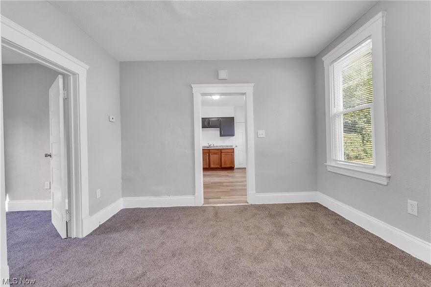 Whether you're looking for your first starter home or wanting to build your rental portfolio, this single-family home has plenty to offer! Walk into the living room featuring plush carpeting and large windows allowing for tons of natural light! Continue through to the kitchen with plenty of space for dining and a window overlooking the yard! Two bedrooms are located on the first floor complete with plush carpeting and closet space! The full bathroom is conveniently located on the first floor with a shower and tub combination! Upstairs you will find an incredibly spacious third bedroom! This home has easy highways access and is close to Downtown Cleveland! The basement offers tons of space for storage and a separate laundry area! Near food, shopping and public transit this won't last long! Don't miss out on this solid property - schedule a showing to see it for yourself!