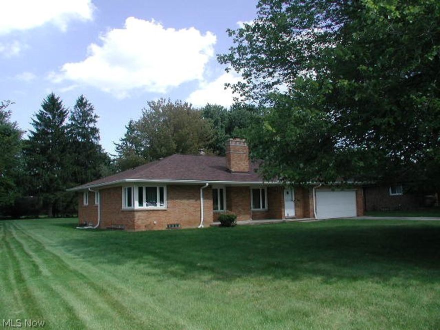 Large all brick ranch with full basement on large treed lot. Kitchen countertops, backsplash and sink refinished 3/2016 with new faucet. New roof 2015. Updates in last nine years: remodeled both baths, electrical, glass block basement windows and kitchen floor. 90+ efficiency furnace. Vinyl windows. Interior basement waterproofing. All kitchen appliances stay plus washer & dryer. Living room with beautiful cove ceilings and gas fireplace. Hardwood floors throughout main floor except kitchen. All bedrooms with double closets. Dining room has French doors leading to the covered back porch and patio overlooking the park-like backyard. Swing set and some patio furniture stays. Finished rec room has wet bar and gas fireplace. Two more huge spaces in the basement with utility room, 2nd room can be workshop/hobby room/work-out room or storage. Preschool is directly across the street. Close to shopping, rec center, library, highways, etc. Beautiful area of brick and homes of character.