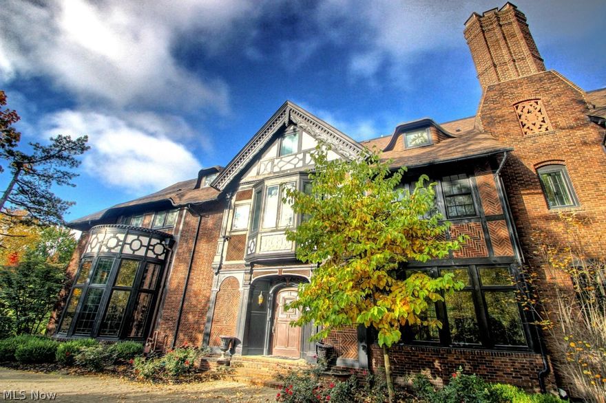 Enjoy the 21st Century lifestyle while embracing the original historic details of this exquisite landmark Tudor. Designed by renowned architects Frank B. Meade and James M. Hamilton in 1918, this home is sited on 2.6 scenic acres overlooking the Marshall Lake! 6 Bedrooms, 8 Bathrooms, a library, theater room, 4 car garage! The owners have not spared any money in restoration and upgrades- priced well below cost! You are not only purchasing an unbelievable mansion at a great price, you are purchasing a magnificent piece of history!