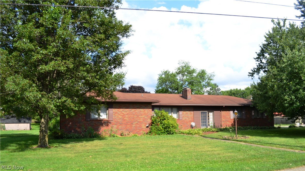 Extremely well built brick ranch on a very large lot in Brightwood. This home has a large living room and huge lower level family room with fireplaces in both!
3 bedrooms, 1 full and 2 1/2 baths. A galley kitchen and dining area with french doors that lead to the patio. Many desirable features and immediate possession.