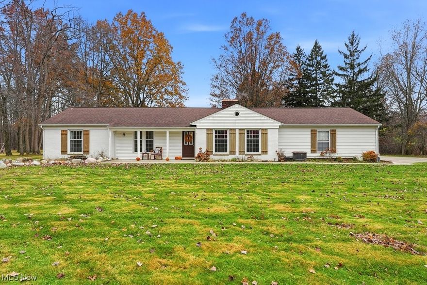 You will appreciate the setting of this beautifully maintained ranch situated on approximately 1.7 acres, approx. 3 miles from the historic downtown area of Chagrin Falls. This home offers 3 bedrooms, 1.5 bathrooms, and a 2-car attached garage, all on one level and close to shopping, grocery stores, retail, and major roadways.

The open, airy floor plan includes an updated kitchen that flows into a large dining room featuring built-in display shelving and a fireplace. the kitchen and the dining area open to a spacious family room with a second fireplace and glass sliding doors leading to a covered patio, ideal for enjoying the surrounding natural views. A formal living room provides an additional gathering space and includes its own fireplace. The first-floor laundry room offers generous space and convenience.

Approximate update dates (not guaranteed by seller):
 HVAC (2024)
 Second furnace in attic (age unknown)
 Dishwasher (2023)
 Refrigerator (2024)
 Washer and dryer stay (working but conveyed as-is)
 Well tank and piping (2025)
 Roof shingles (2018)
 Updated windows (except in the owner's suite)
 Electrical panel update
 Bathroom updates with heated floors (2013)
 Front walkway and porch (2020)
 Hot water tank (2019)
 Well bladder (2019)

This property combines comfort, space, and thoughtful updates, ready to welcome its next owner.