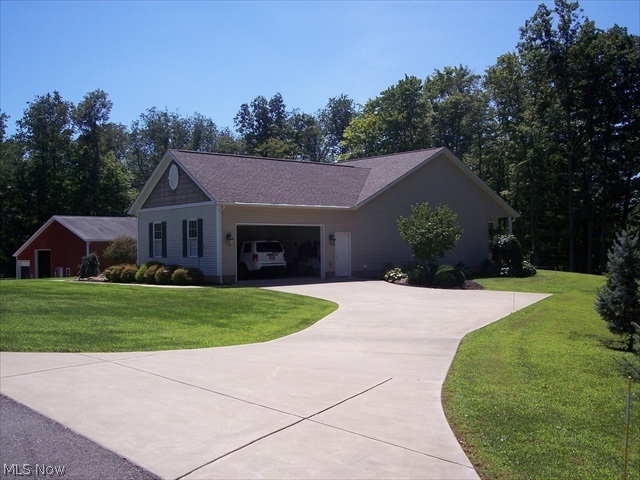 SELLER RETAINS THE GAS AND OIL PLUS ALL MINERAL RIGHTS. SPECTACULAR HOME ON 12 ACRES OF PRIVACY, MANY UPDATES AND AMENITIES, MAPLE CABINETS, 6 PANEL DOORS. RELAX IN THE SUNROOM OFF THE MORNING ROOM WITH CUSTOM WINDOW COVERINGS. SELLER IS OFFERING AN AMERICAN HOME SHIELD WARRANTY. LARGE INSULATED POLE BARN AND WORKSHOP SALE PENDING