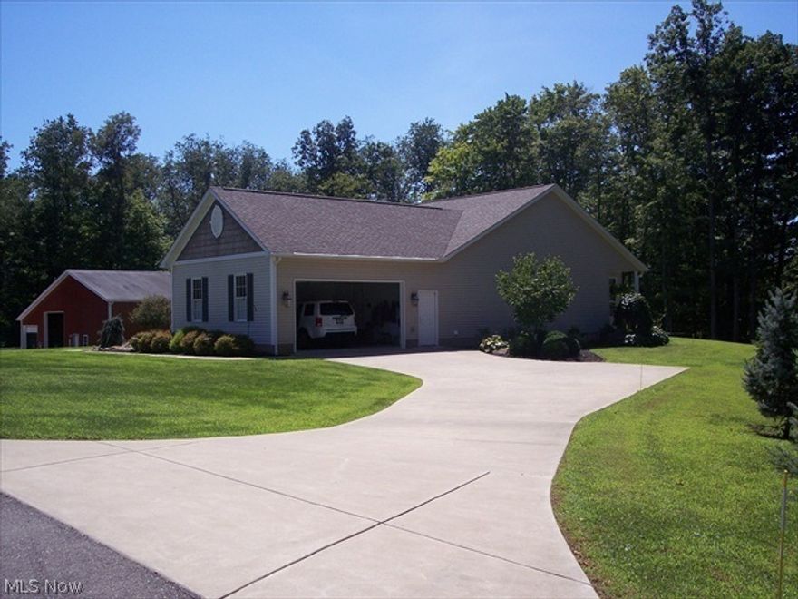 SELLER RETAINS THE GAS AND OIL PLUS ALL MINERAL RIGHTS. SPECTACULAR HOME ON 12 ACRES OF PRIVACY, MANY UPDATES AND AMENITIES, MAPLE CABINETS, 6 PANEL DOORS. RELAX IN THE SUNROOM OFF THE MORNING ROOM WITH CUSTOM WINDOW COVERINGS. SELLER IS OFFERING AN AMERICAN HOME SHIELD WARRANTY. LARGE INSULATED POLE BARN AND WORKSHOP    SALE PENDING