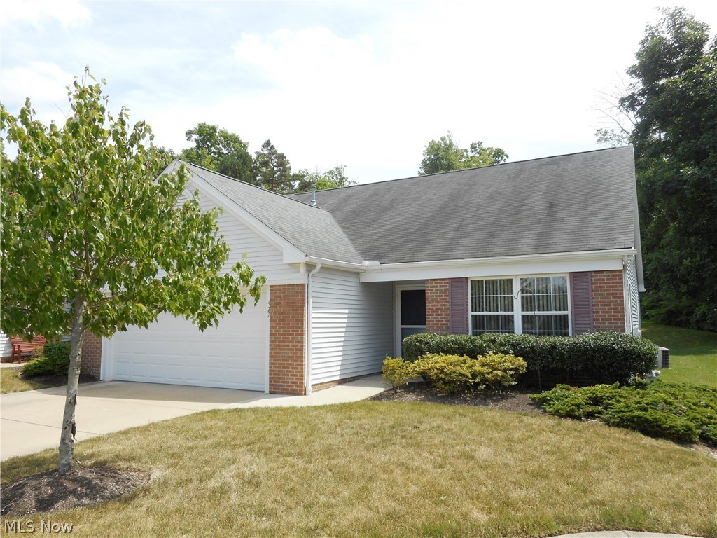 Desirable end unit condo with 2 spacious bedrooms and 2 full baths. Both bedrooms offer walk-in closets and the master bath features an updated walk-in shower. The vaulted great room is open and airy and provides plenty of space for a dining area. A spacious kitchen offers both a pantry and a dinette area. Sliders open to the bright sun room with baseboard heat allowing you to use it year round. The entire condo was painted in 2012 and the hot water tank was replaced in 2010. A convenient first floor laundry and 2 car garage complete this lovely home. The seller is offering a home warranty for peace of mind.