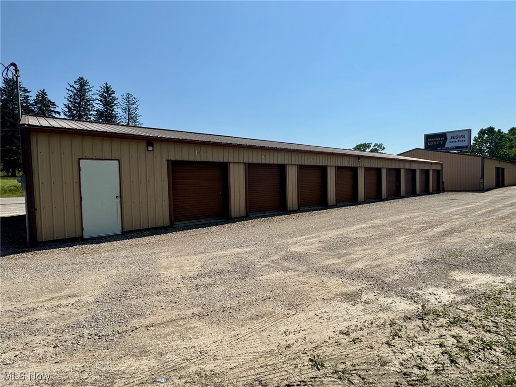 Investment property! 26+/- storage units and 2 rental homes that are fully occupied situated on over 2 acres! The storage units are as follows: 8- 10x20 units, 10-10x10 units, 3-12x25 units, 1- 20x40 unit, 1-36x40 unit, and 2-12x15 units. Storage units include a large parking area and fenced area that could be additional income. 2 rental homes are adjacent to the units and fully occupied with leases as of August 2023 (36 months). Rental homes are $1600 and $1800/monthly. Property also has a billboard on it that pays $1600/yearly through Barnes. See attached sheet for rental rates and breakdown, financials are available upon request. No showings on the rental properties to not disturb the tenants. Over 639 Ft of frontage on RT 40 (West Pike).