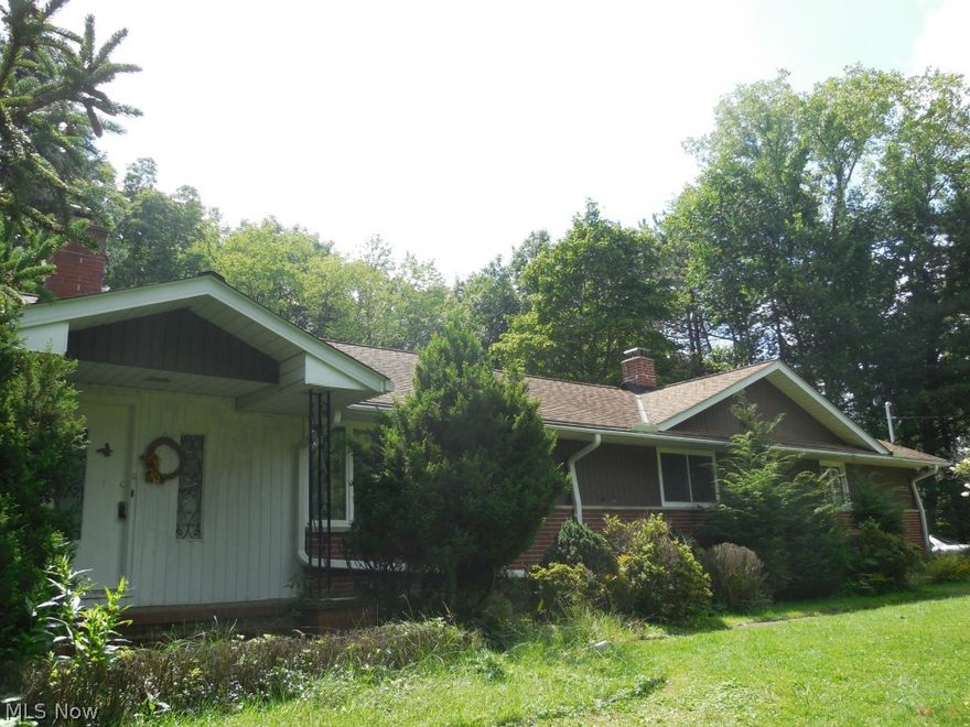 Updated electrical-2013. Tons of cupboards and storage space. Basement is an additional 1815 square feet, has a separate laundry area, separate work shop, fireplace and full bath. Eat-in kitchen. Family room has built-ins and a wood burning fireplace. 3 car garage. Home is on an acre of land and has a storage shed. Optional membership to Walton Lake includes a lake that is filtered & chlorinated on 13 acre site. Certified lifeguards are on site 1-8PM every day of swimming season (weather permitting). There is a pavilion can be used for parties, a playground, grills, picnic tables & volleyball area.