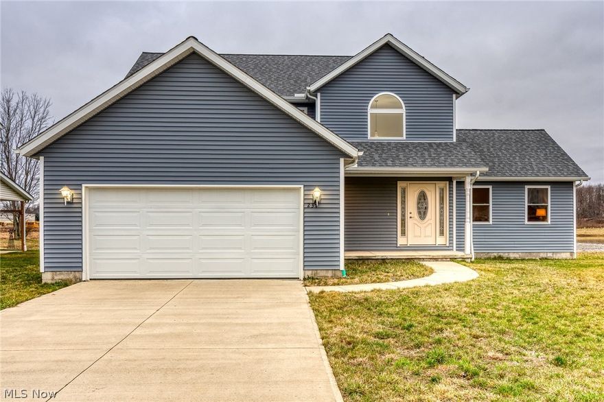 You won't want to miss this stunning brand new construction home! The kitchen features a brand new stove and refrigerator, a large island,
granite countertops, and soft-close cabinets. Off the back of the house there is a large deck with a lovely view of the pond. The master bedroom
is located on the first floor and has a full bathroom with a double-sink vanity. Giving this home a hint of a traditional feel, the living room
highlights a fireplace and ceiling fan. Upstairs, there are three bedrooms and two bathrooms. Off of one bedrooms there is a second-floor porch.
Schedule a viewing to see this stunning Elyria home.