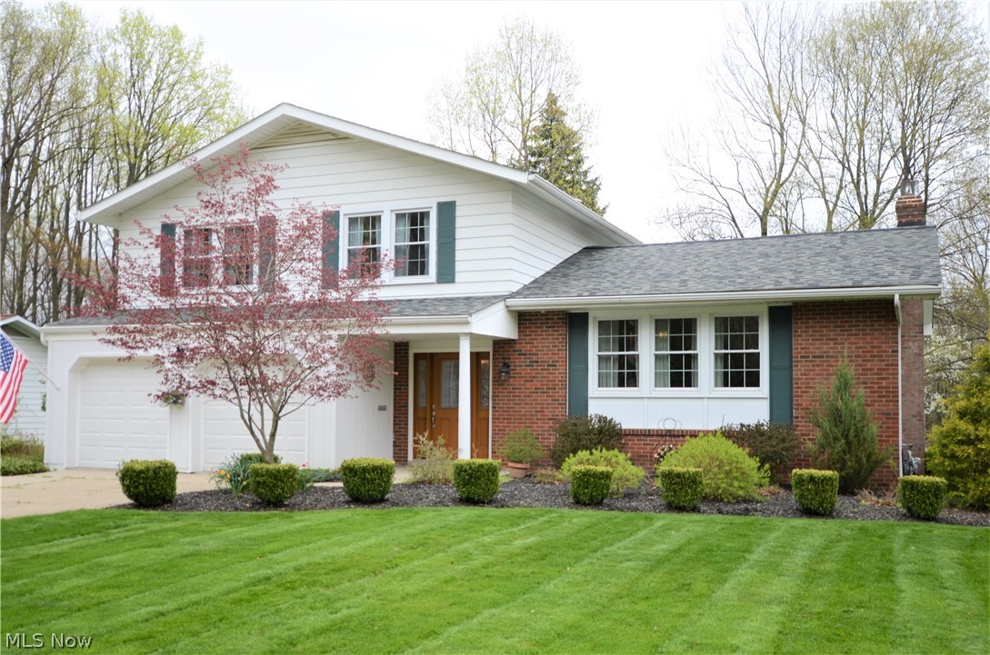 Lovely 4 bedroom, 2 ½ bath Brecksville split level, situated on a beautiful .55 acre lot. As you enter the foyer, you can go straight through to the eating area of the kitchen. The family room has built-in bookshelves and sliding door access to the deck and large back yard. The powder room can also be accessed from the hall. From the eat-in area, you take three steps up to the kitchen prep area where you’ll find nicely refinished cabinets and wood flooring. All the appliances will remain. The dining room features a built-in china cabinet and crown molding, and it accesses the large living room with views of the front yard. The third floor offers a master bedroom with en suite bath, and three additional bedrooms with a guest bath. All the bedrooms include hardwood floors and ceiling fans. Highly rated Brecksville-Broadview Heights School District and walking distance to the middle and high schools. Please see the attached list with all the upgrades in the last few years!