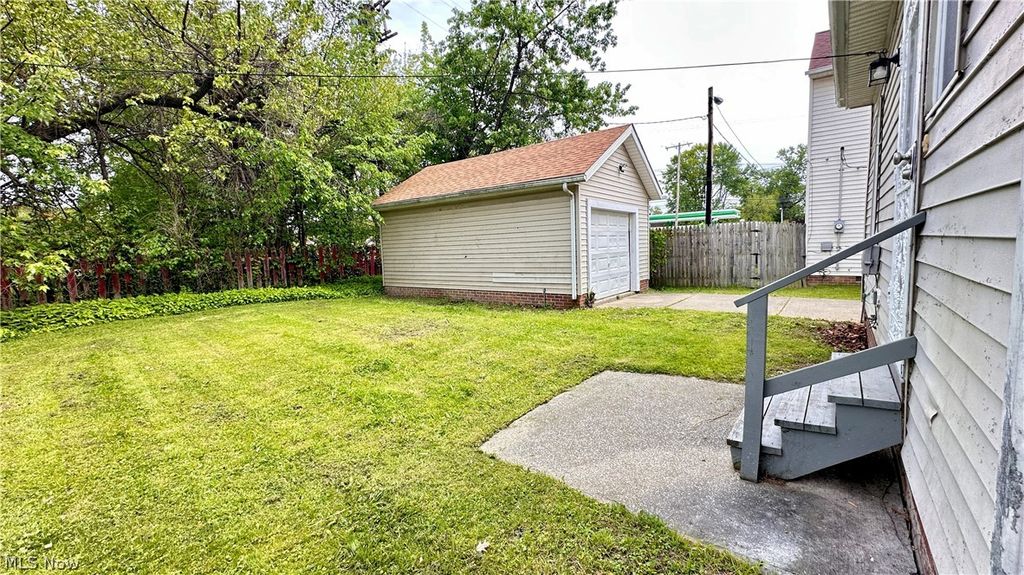 Photo of 571 E 115th Street, Cleveland, OH 44108 (MLS # 5210900)