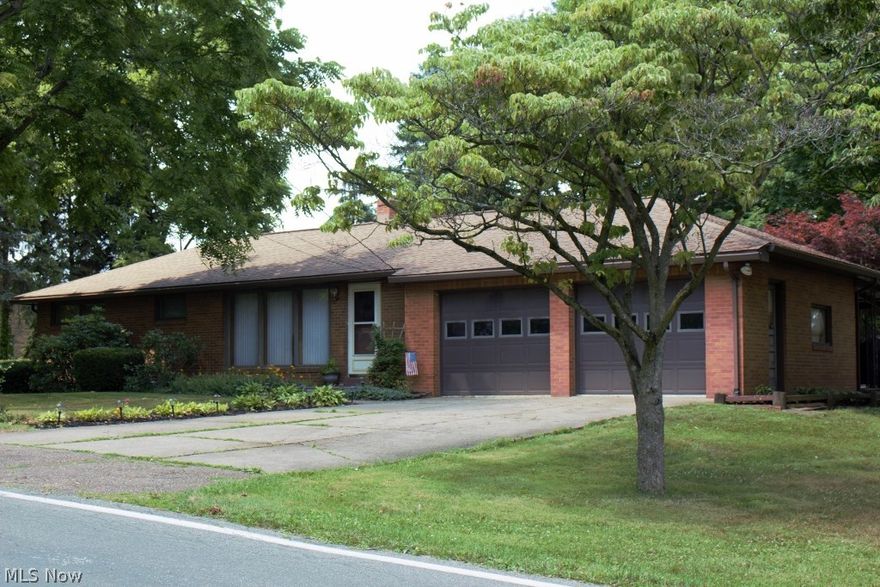 A beautiful brick ranch home in a great location, next to a golf course. Open the door to newer laminate flooring flowing from living room to a dining area. Heading into the kitchen with a brand new stainless dishwasher July 2016, ceramic title, counter tops, back splash, hardware on cabinets. Moving down the hall, the laminate flooring, main bath on the right, 2 bedrooms on the left and then the master at the end of the hall way. Head outside to the covered patio and deck area. The patio covering will keep you cool out of the sun or move out onto the deck and soak up the rays. This deck area has a special water feature that just needs a new pump get the water flowing for a waterfall effect. There is plenty of space in this shaded back yard to have fun or garden.
Back into the house and head for the basement were you will find that a good portion of the walls have been framed and electrical run. Now just needs some finishing touches to create additional livable space. A Radon system w