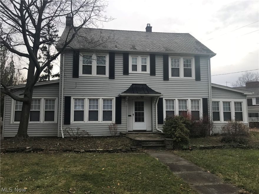 4 bedroom 3 full bathrooms, 1 half bathroom, almost 2100 sqft  Colonial in Shaker Heights. ( The Tri-School Area).  Updated Kitchen, Formal Dining room.  Harwood Floors. Living room has wood burning fireplace. Library/Office with built in bookshelves. Sunroom off the dining room.  Master bedroom has Master bath and multiple closets! 3rd floor bedroom is set up as finished suite with a full bathroom. Paved driveway goes to a 2 car garage. Newer vinyl siding, newer windows, newer electrical panel, new HWT.  NEW carpet installed in dining room.   This is a HUGE opportunity to get into a colonial in Shaker - DONT miss it.