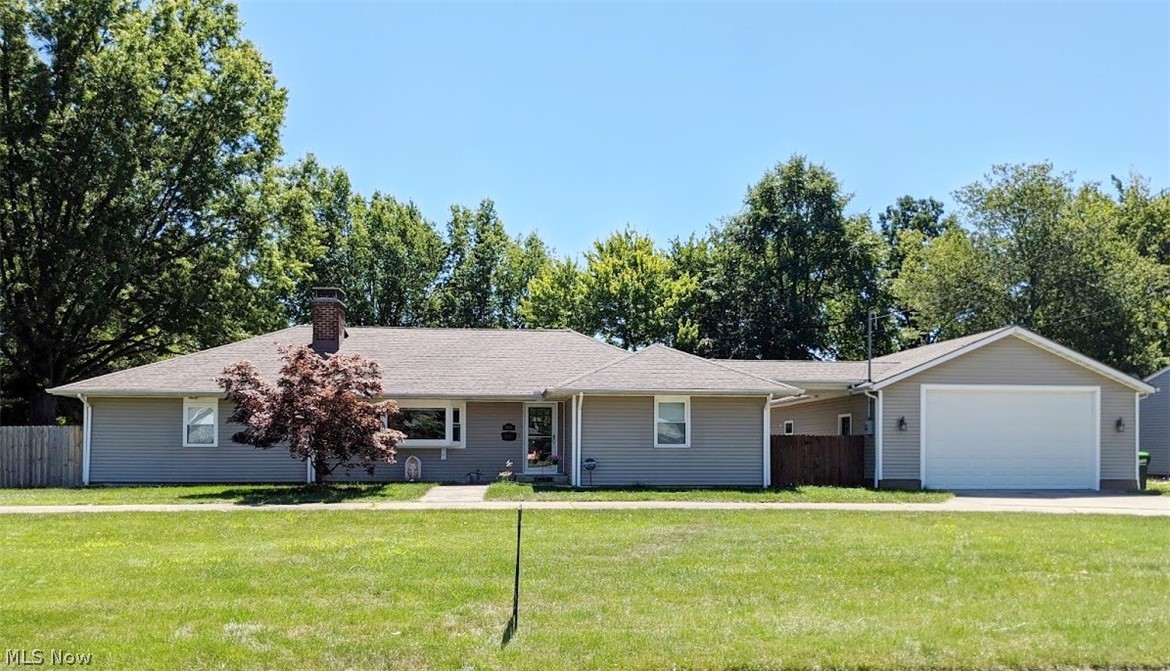 LOCATION, LOCATION!! Nothing to do but move in!! Totally updated ranch has an oversize tandem 4-CAR GARAGE with overhead gas furnace, 220 line and an additional back overhead door out to the large .98 Acre lot!!! Circular driveway! Fully fenced backyard has privacy fence on 3 sides, the rear of the lot backs up to the Senior Community Center and Jindra Park with a pool! Super thick and efficient cinder block walls with vinyl siding! Gas forced air heat with additional electric baseboard heating with individual room thermostats! New flooring, paint, fixtures, doors, Pella windows and carpeting! Living room features a wood burning fireplace and beautiful bay window with custom energy efficient custom blinds that remain! LARGE eat-in kitchen has soft close cabinets, quartz counter tops, Samsung appliances, and TWO large double pantries with pull out shelves! Custom kitchen blinds to match the tile backsplash! Sliding Pella glass doors lead out to the back deck! New toilets, va
