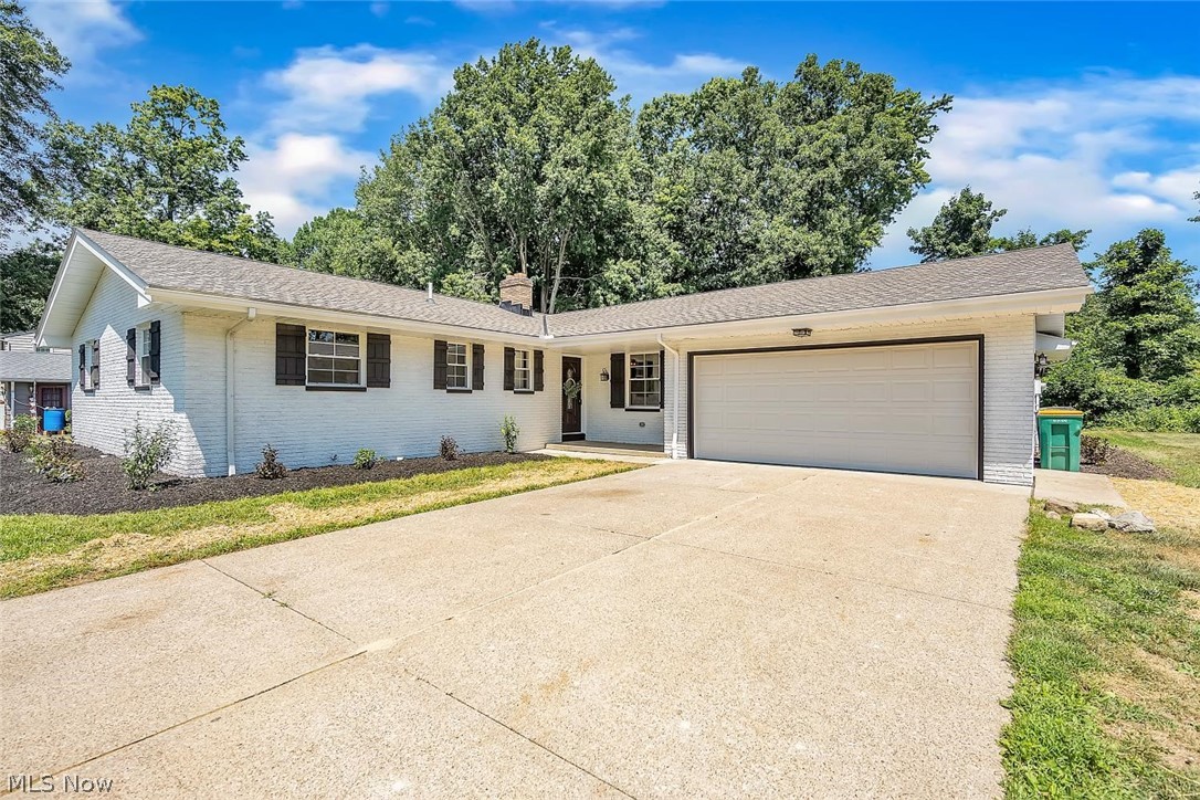 Welcome to this sprawling 3 bedroom 2 1/2 bath South Mentor ranch that has been completely renovated to boast a spacious welcoming open floor plan. Beautiful durable LVT flooring throughout the main living space. New carpeting in bedrooms. Marbled ceramic tile in bathrooms and mud room/laundry. Newly converted Gas fireplace, New Roof in 2021. New garage door and windows 2021. All new exterior doors and slider. Half bath has its own "instant hot" hot water tank. easily assessable crawl space. The kitchen has new stainless appliances and pull-out microwave. Faucet has light feature to indicate cold vs hot water. Quality hardwood cabinets with soft close feature. 5x6 panty was added and not included in the sqft on the auditor's site. Garage has its own heating unit. This property was completely gutted, brought back to life and excited for its new owner/s