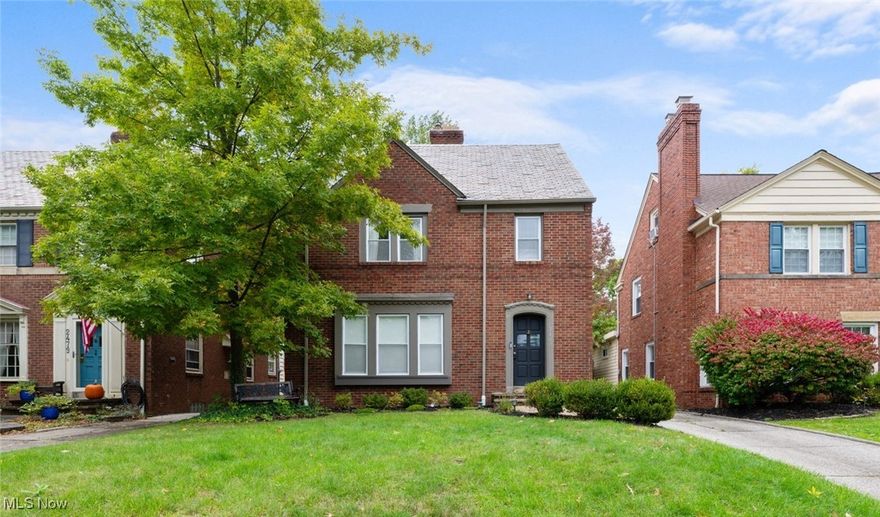 This charming 4-bedroom brick home, nestled in the heart of University Heights, showcases beautiful hardwood floors throughout most of the home. The bright and spacious living room, adorned with a large picture window and decorative fireplace, sets a welcoming tone. A formal dining room, perfect for hosting dinner gatherings, opens to a versatile bonus room that could serve as a cozy family room, complete with built-in cabinetry and sliding doors leading to the rear patio. The kitchen features warm-toned cabinetry, a stylish backsplash, and stainless-steel appliances—all included. A charming breakfast nook provides the perfect spot to enjoy your morning coffee. A convenient half bath completes the main level. Upstairs, you'll find three generously sized bedrooms and a full bath with both a tub and a walk-in shower. The third-floor retreat boasts a large bedroom and an elegant full bath with a clawfoot tub. The fully finished rec room, complete with a decorative brick fireplace and wet bar, is the perfect space for family movie or game nights. Outside, relax in the beautifully landscaped, partially fenced yard with a peaceful patio—ideal for entertaining or quiet evenings. Detached two car garage. Recent updates include a new rooftop railing, refreshed basement lighting (2024), landscaping enhancements (2020-2024), and a redone roof for the addition, interior paint, and both first and second-floor bathrooms feature new vanities, while the back addition received new flooring in 2022. Additional improvements include new copper roof valleys and all-new appliances in 2020. With its blend of classic charm and modern updates, this University Heights home offers comfort, versatility, and a peaceful backyard retreat. Don’t miss your chance to make it yours!