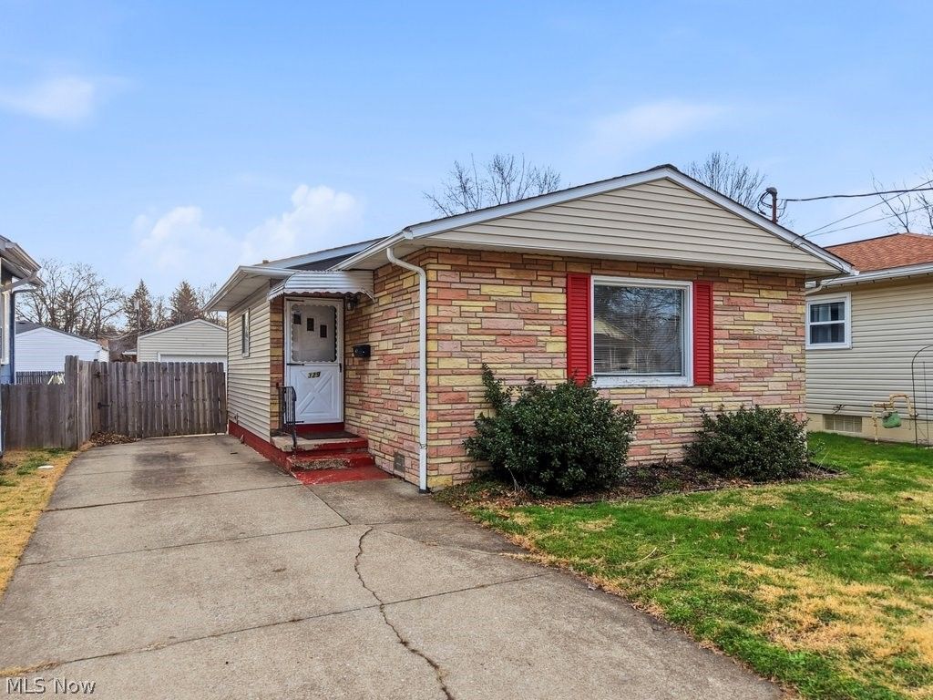 Photo of 329 Dennison Avenue, Akron, OH 44312 (MLS # 5195433)