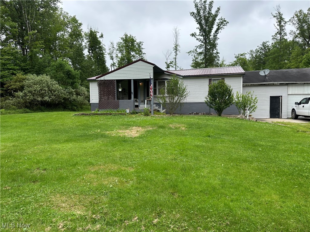 Are you looking for a private oasis on scenic and serene 5.63 acres? Well, you've found it. This 3-bedroom, 2-bathroom gem is situated on a private lot next door to Camp Sugarbush! You will be surprised and delighted with the privacy the wooded acres provide. Inside the home, you will find plenty of natural light, ample storage space, and an open layout, with vaulted ceilings! The primary bedroom features a full bathroom and large closet. This home is waiting for the new owner to make it uniquely their own!! The metal roof offers peace of mind, and the sliding glass doors off the dining room allow for dining al fresco or enjoying your morning coffee in nature. Book your appointment today and don't let the opportunity pass you by! All offers and terms subject to Probate Court approval.