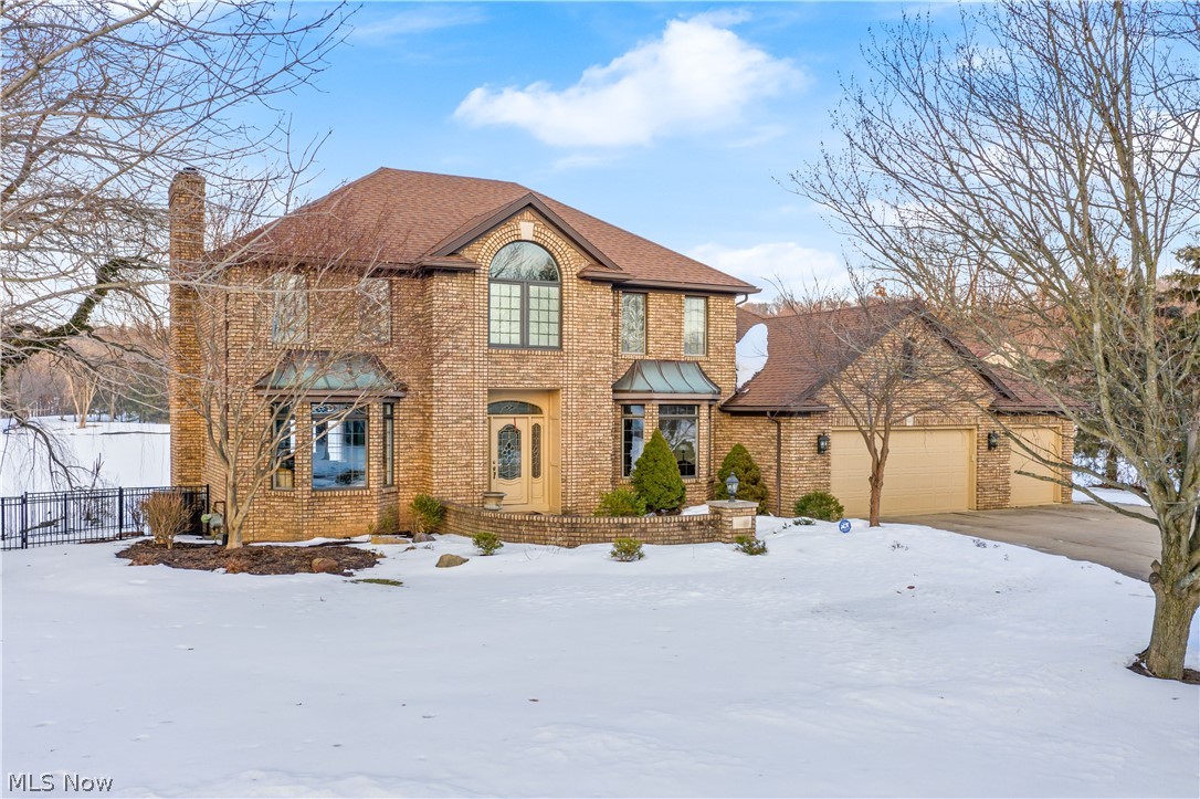 Amazing view overlooking Nobles Pond. Quality Alpha Construction built brick home with upgraded amenities, wonderful Schrock Kitchen cabinetry, new granite countertops, double ovens and center island/breakfast bar open to Dinette, Sun Room and Family Room with bay window. New luxury vinyl plank flooring, office on 1st floor and finished lower level with daylight windows. New water heater, luxurious Master Suite, 3 car garage, deck gazebo, new stamped concrete patio. Newer aluminum fenced in backyard with back gate. You will never want to leave home with a backyard and view like this!