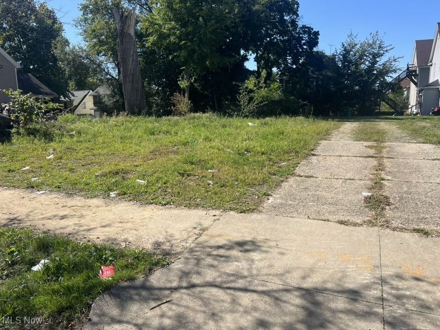 Residential lot within walking distance to the University of Akron. Previous residence was demolished after a large tree fell on it. Tax records are still showing the house and detached garage but both have been removed. Contact the county directly with any questions regarding zoning or building limitations. Cash only. Seller will not consider seller financing.