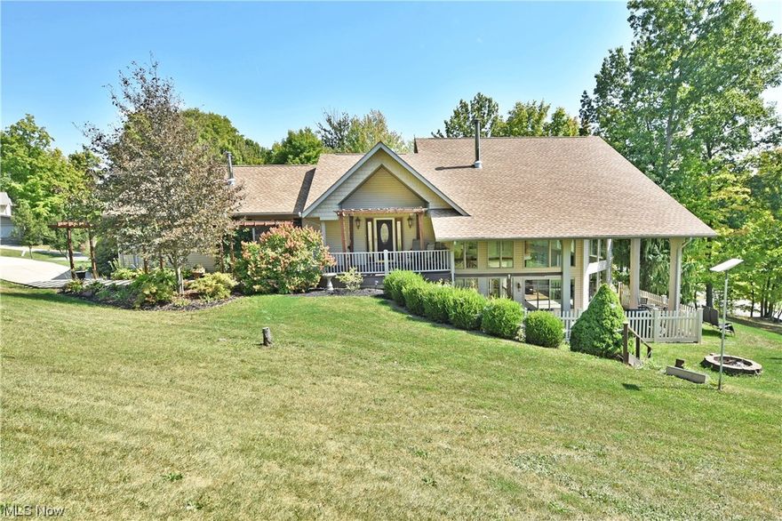 FALL in love with this one of a kind home in a gated serene community in United School District. This phenomenal residence showcases two floors of masterfully presented and thoughtfully updated living space with breathtaking views of Seven Springs lakes and surrounding Guilford Lake with fishing access. Walking up to the home through the pergola walkway enter into a stunning kitchen and living space with an open floor plan with stone fireplace, breakfast bar, granite countertops, updated stainless appliances and formal dining with beautiful natural light pouring through two levels of windows. The Master suite with full bath and whirlpool tub, second Bedroom, bath and laundry round out the first floor.  

The walk out lower level is perfect for the active growing family, or just additional space for friends and family featuring a living room space and two bedrooms with central bathroom access. The heated and air conditioned garage with work space areas can easily accommodate 3 cars.  Outside storage building with loft for storage and more. The home features a brand NEW roof, HVAC system, well filtering system with full home reverse osmosis, all spaces are freshly painted with clean neutral colors, shutters and shed make this home fully move in ready!