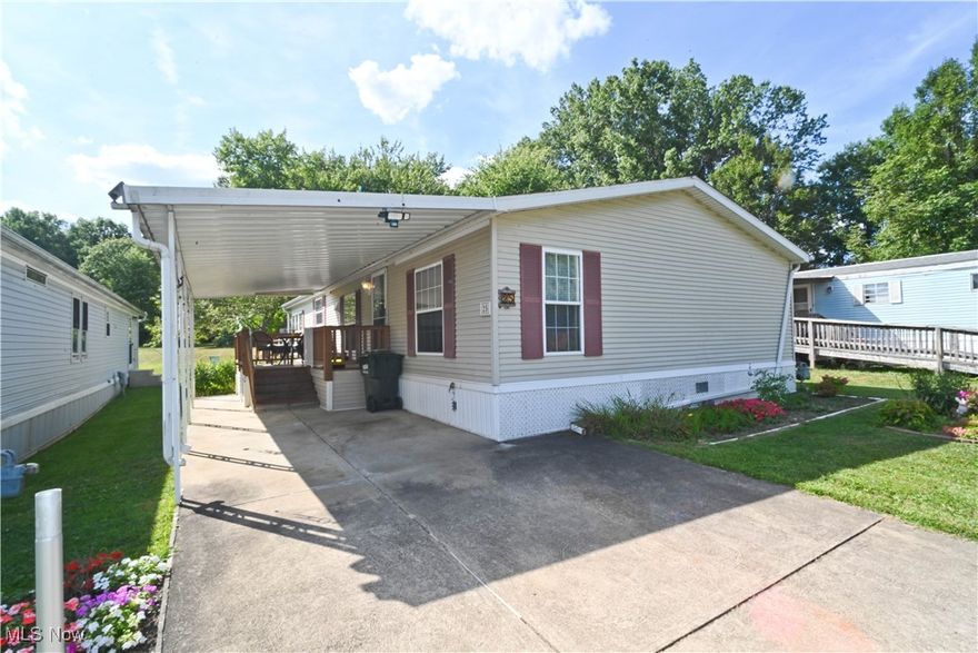 Looking for easy one floor living? This mobile home located in Sebring Estates is situated on such a great lot and it offers not only a neat and well maintained interior, this one offers wonderful exterior spaces as well! Gorgeous views can be found outside while relaxing on a great covered side porch! If you love the sun, enjoy the open air back deck! Oversized living room and huge formal dining spaces. The kitchen has so much to offer including all appliances, along with tons of cabinet and counter space! Awesome natural lighting flows thru the dinette! First floor laundry with washer and dryer. The owner suite has space for a large bedroom suit and don’t miss the walk in closet and a private full bath. Two additional bedrooms plus a full guest bath. You get great closet space for needed storage. New furnace and central air! Water filtration stays. Nice carport. Vinyl sided. Large shed to store your lawn supplies! Calll today, let’s see if this is what you have been waiting for!
